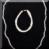 J10. Pearl necklace and bracelet. 